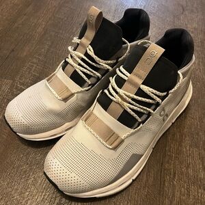 On Running Black and White Athletic Shoes